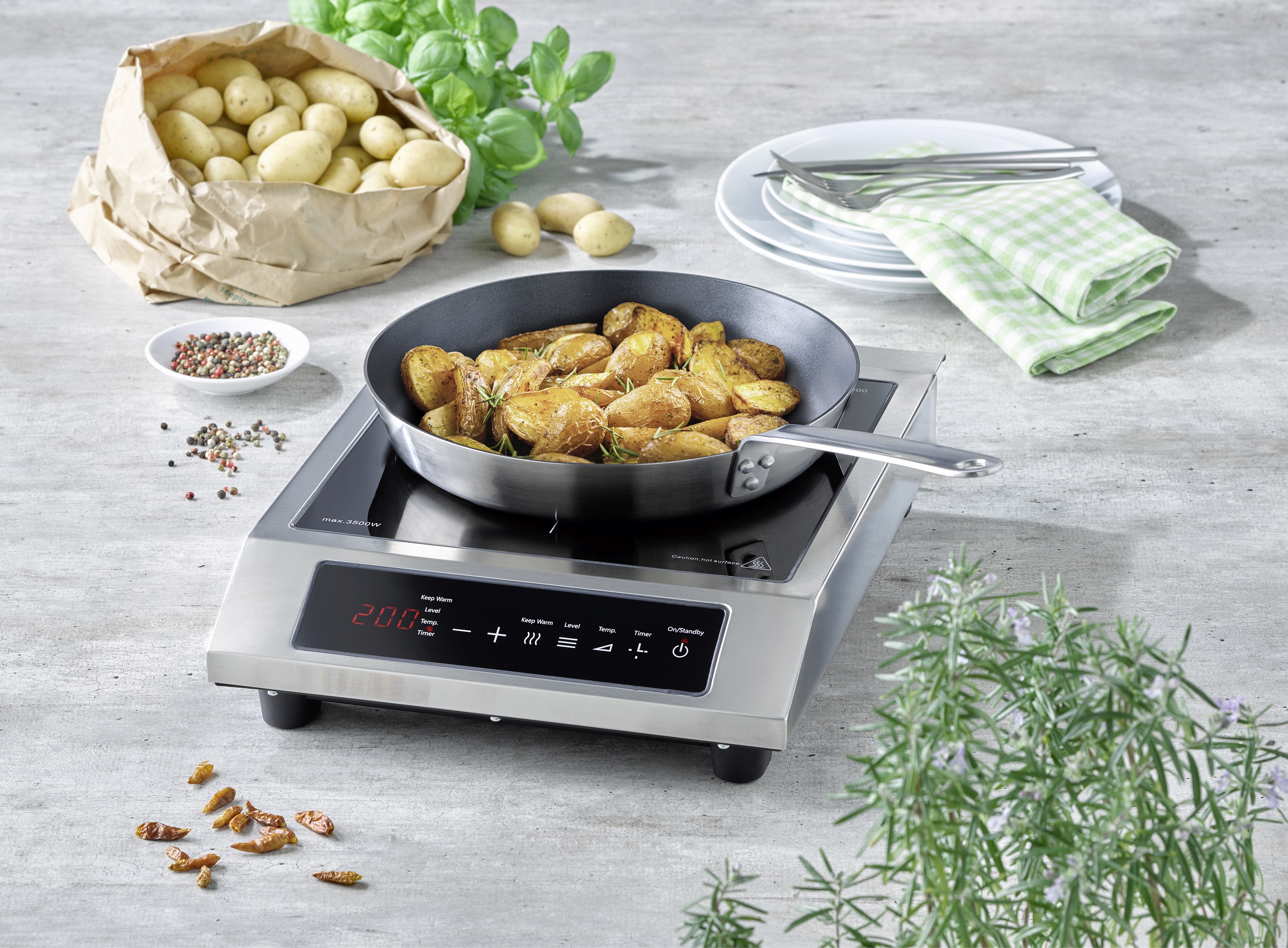 CASO Design mobiles Induktionskochfeld im Betrieb